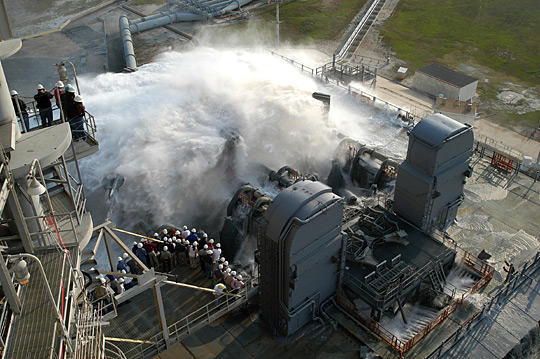 Water is released onto the mobile launcher platform on Launch Pad 39A