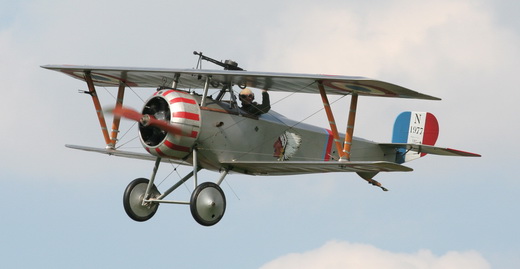 Replica Nieuport 23 flying with Lafayette Escadrille insignia.