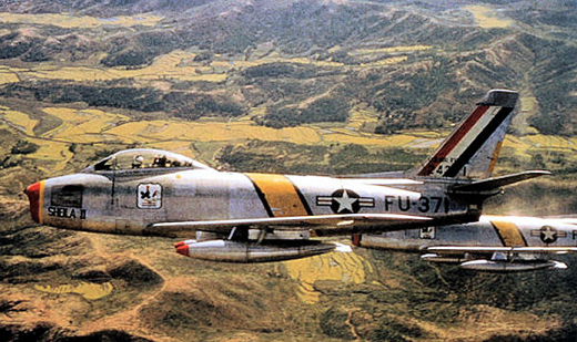 
North American F-86F-25-NH Sabre AF Serial No. 52-5371 of the 18th Fighter-Bomber Group, 1953. Aircraft marked as Wing Commander's.