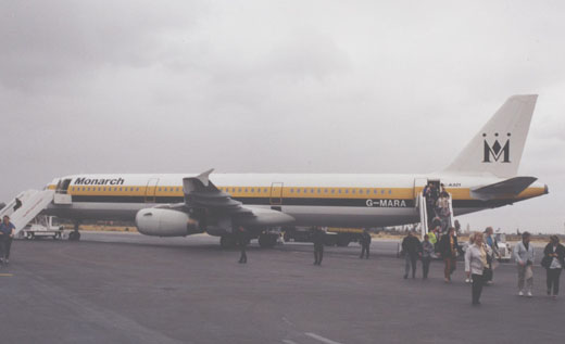 
Passengers leaving an Airbus A321 of Monarch Airlines on a charter flight from Manchester at Menara airport in 2000