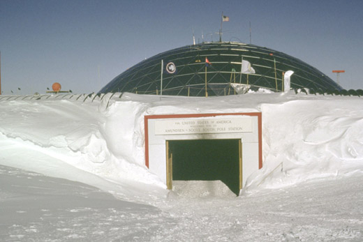 
The main entrance to the former geodesic dome ramps down from the surface level. The base of the dome base was originally at the surface level of the ice cap, but the base had been slowly buried by snow and ice.