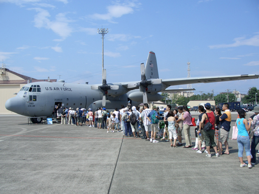 
Friendship Festival - Local Japanese entering a C-130