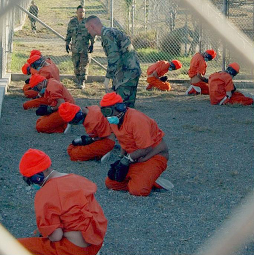 
Detainees upon arrival at Camp X-Ray, January 2002