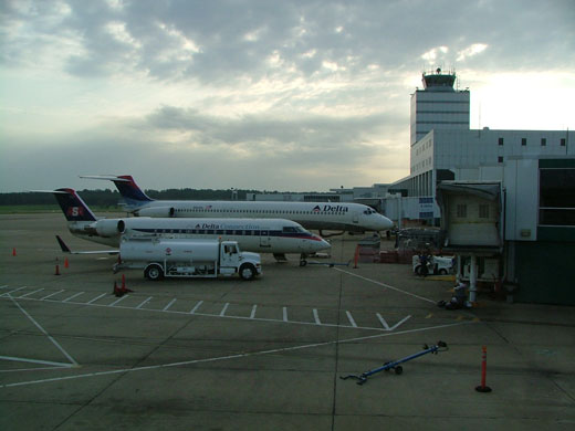 
Jackson-Evers International Airport in July 2005. View from the West Concourse looking east across the tarmac. The aircraft in the foreground is a Canadair Regional Jet operated by Atlantic Southeast Airlines. Behind it is a Delta Air Lines McDonnell-Douglas MD-88.