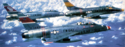 
North American F-100C-1-NA Super Sabre, Serial 53-1743 of the 336th TFS (yellow) with two F-100F-10-NA Super Sabres (56-3868, 56-3842) of the 333d TFS (red) of the 4th Tactical Fighter Wing.
56-3842 was sold to Denmark in 1974, later being sold on the civilian marketplace, being registered as N417FS in 1982.