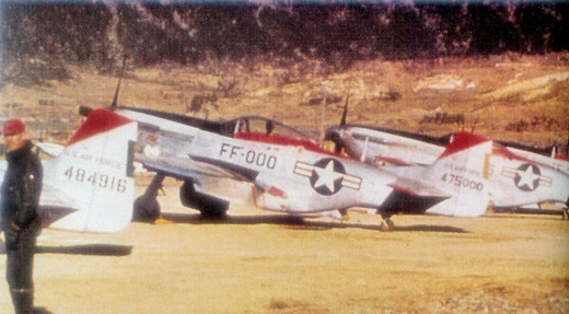 
North American F-51D-25-NT Mustangs of the 67th Fighter-Bomber Squadron (18th FBG). AF Serial No. 44-84916 and 44-75000 identifiable.