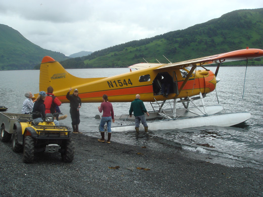 
A De Haviland Beaver, part of the Andrew's Airways fleet dropping off tourists at a remote lodge on Raspberry Island (Alaska)