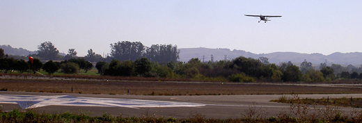 
prop plane taking off from Petaluma Municipal Airport
