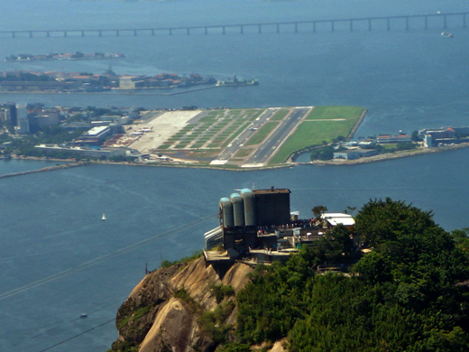 
Aerial view of Santos Dumont location. The Rio-Niterói Bridge in the background, and the Sugar Loaf (Pão de Açúcar) in the foreground.