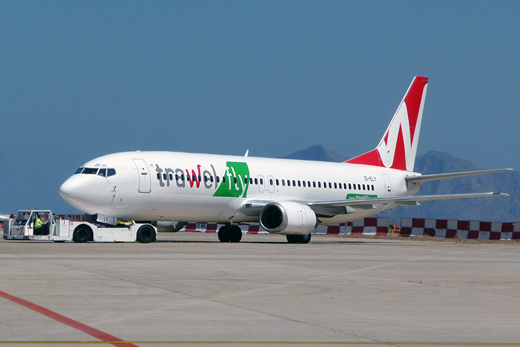 
A TrawelFly Boeing 737 during push-back.