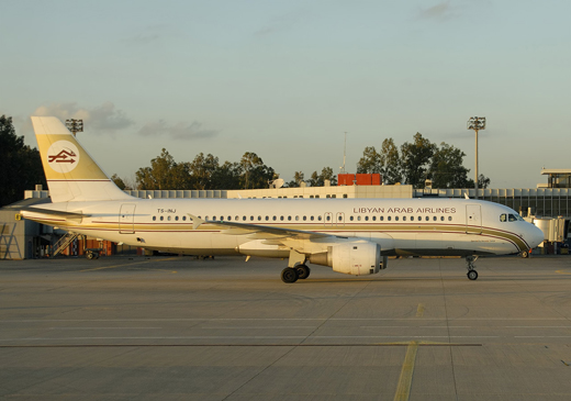 
A Libyan Airlines jet taxis in the international terminal
