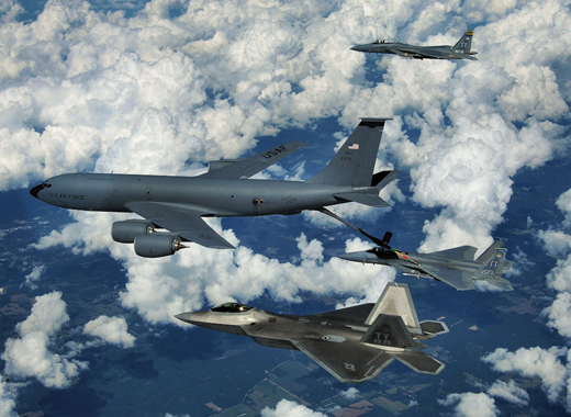 
An F-22 Raptor and two F-15 Eagles from Tyndall Air Force Base participate in a refueling mission with a KC-135 Stratotanker from the Mississippi Air National Guard over eastern Florida, September 22, 2008.