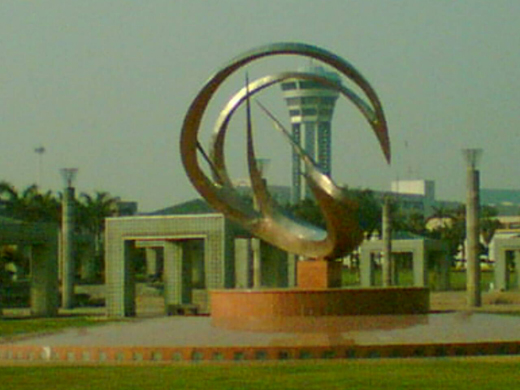 
An emblem of the airport. Behind, the control tower can be clearly seen