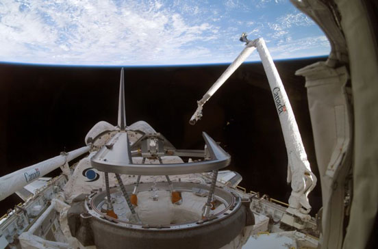 
The CANADARM in action on the Space Shuttle Discovery during STS-116.