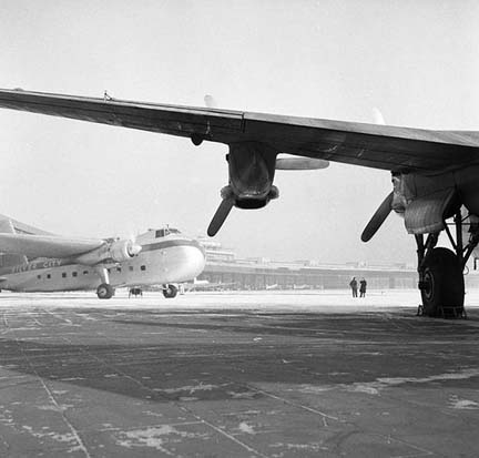 
A Silver City Airways Bristol Freighter viewed from under the wing of an Avro York at Berlin-Tempelhof, 1954.