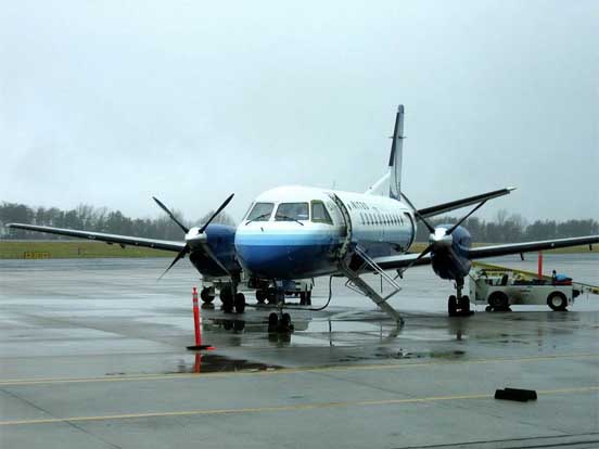 
A Colgan Air / United Express Saab 340 prepares to accept passengers. Charlottesville-Albemarle Airport, 2005.