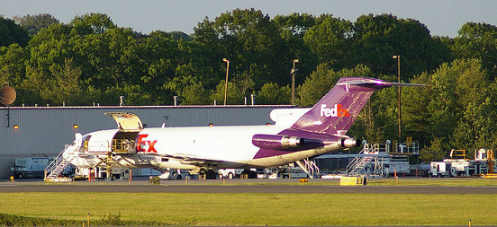 
A FedEx 727 at PWM with cargo doors open.