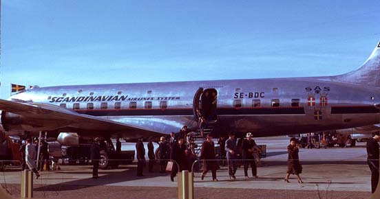 
Passengers deplaning an SAS DC-6. Note the upper row of windows, indicating this was built as the optional sleeper variant of the original length DC-6