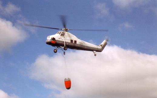 
Civil S-58T fire fighting with a Bambi bucket