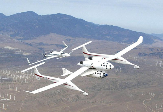 
A Beechcraft Starship chasing a Scaled Composites SpaceShipOne during a test flight