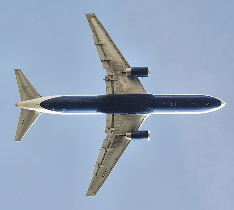
Planform view of a British Airways 767-300 after take off, with retracted landing gear and partially deployed flaps.