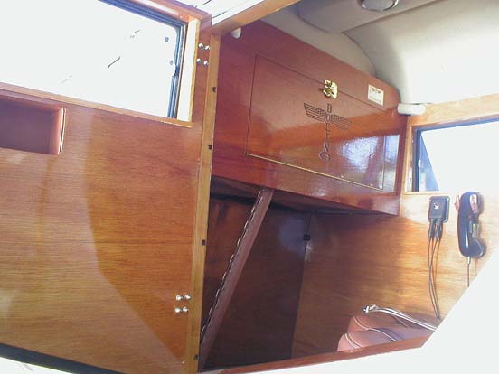 
Model 40C front seat of rear passenger cabin showing the fold-down writing desk/table.