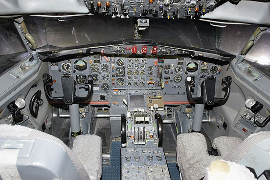 
Interior close-up photo of the pilot and co-pilot area of a flight simulator for a Boeing 727 at the Pan Am International Flight Academy
