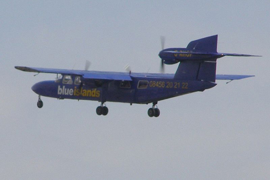 
A Trislander, operated by Blue Islands Airline, departing Shoreham Airport, Shoreham-by-Sea, West Sussex, England.
