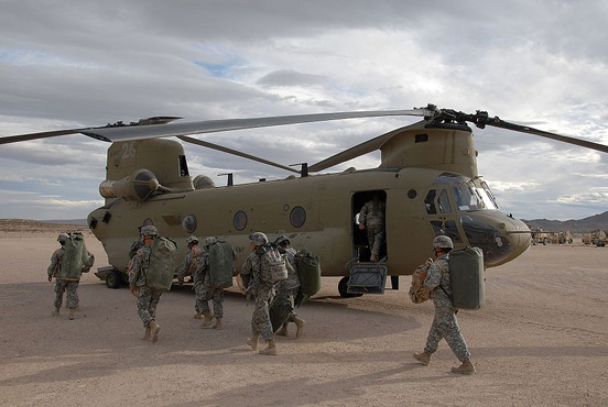 
Soldiers prepare to board a CH-47F at the National Training Center, Fort Irwin, Calif., November 2007.