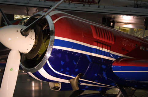 
A Sukhoi Su-26 with red, blue, and purple cowling. Displayed in the National Air and Space Museum of the Smithsonian Institution in Washington, D.C.