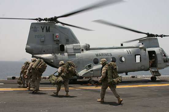 
US Marines from the 24th MEU prepare to board a CH-46.