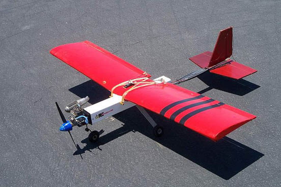 
This homebuilt high-wing model is an example of the concept of Simple Plastic Airplane Design where readily available and easily workable materials are used to create a simple, rugged airframe