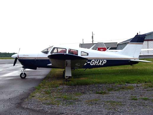 
Piper PA-28R-200 Cherokee Arrow showing the landing gear doors that distinguish this retractable gear model
