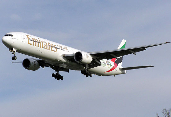 
An Emirates 777-300 landing at London Heathrow Airport
