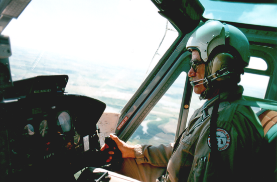 
A Canadian pilot who holds an Airline Transport Pilot Licence - Helicopter, flying a Bell 212 on a medevac mission.