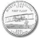 
North Carolina 50 State Quarter features the famous first flight photo of the 1903 Wright Flyer I at Kitty Hawk, North Carolina