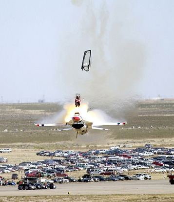 
Thunderbird 1st year Capt. Christopher Stricklin ejected from his USAF F-16 aircraft at an airshow at Mountain Home Air Force Base, Idaho, on September 14, 2003. While performing a Reverse Half Cuban Eight, Stricklin realized he could not pull up in time and ejected. Eight-tenths of a second later, the plane crashed, skidding aflame 200 yards, and the engine flew out and went another 100 yards. Except for a few bruises, he was not injured.