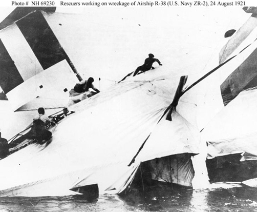 
Rescuers scramble across the wreckage of British R-38/USN ZR-2, 24 August 1921