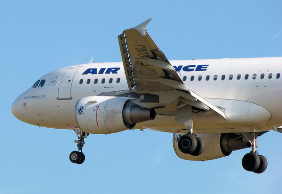 
Airbus A318-100 of Air France landing at London Heathrow Airport, London, England. Click on the picture to see F-GUGJ on the wing undersurface, and the last two letters of the registration (GJ) on the nose wheel doors.
