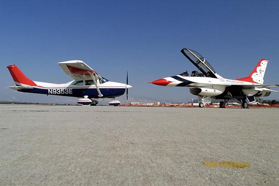 
A Civil Air Patrol Cessna 182 poses with U.S. Air Force Thunderbirds Number 8 at March Air Reserve Base, March 2000