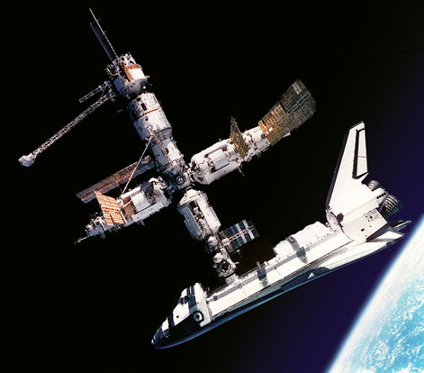 
View of the Space Shuttle Atlantis docked to Russia's Mir Space Station, was photographed by the Mir-19 crew on July 4, 1995