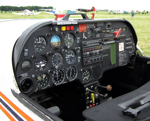 
The cockpit of a Slingsby T-67 Firefly two-seat light airplane. The flight instruments are visible on the left of the instrument panel