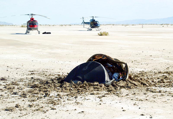 
The sample return capsule crashed into the Utah desert floor, breaking open the capsule. The capsule is about 1.5 m (4.9 ft) in diameter and has a mass of 275 kg (600 lb)