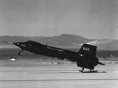
X-15 touching down on its skids. Compare jettisoned lower ventral fin with color picture, top.