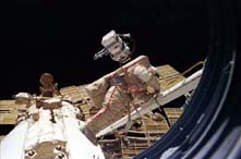 
View of Mir-24 commander Anatoly Solovyev performing an EVA.