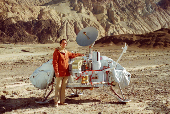 
Carl Sagan with a model of the Viking Lander, for scale (NASA)