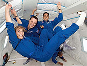 
Mission Specialist Educators Lindenberger, Arnold, and Acaba during a parabolic flight.