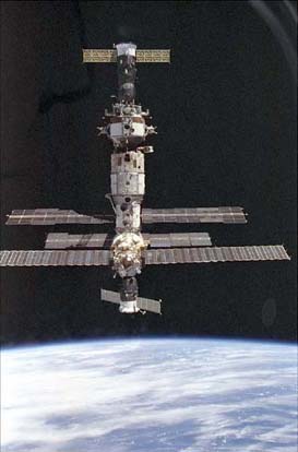 
Soyuz TM-20 is docked to the bottom of Mir, as seen from Space Shuttle Discovery in February 1995 during STS-63