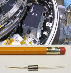 
Closeup of the type of accelerometer that was installed backwards, alongside a pencil for scale (lower section) with a view of the spacecraft capsule and bus.