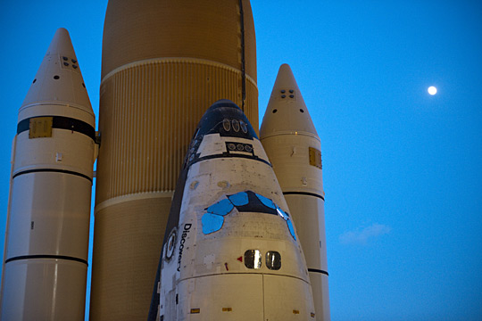 Orbiter and the external tank, flanked by the two solid rocket boosters